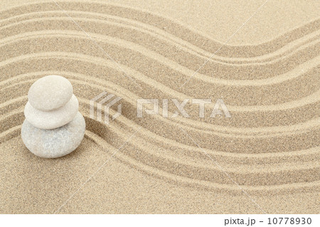 Balance zen stones in sand 10778930