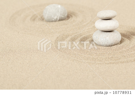 Balance zen stones in sand 10778931