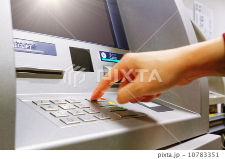 Press cancel button on ATM keypad 10783351