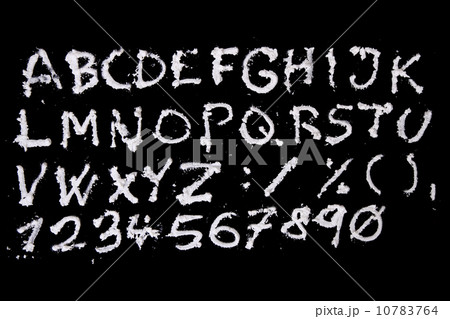 snow christmas alphabet on black background 10783764