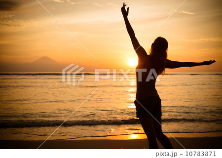 Woman watching sunset Woman watching sunset 10783871