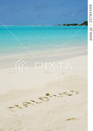 Maldives written in a sandy tropical beach Maldives written in a sandy tropical beach 10784309