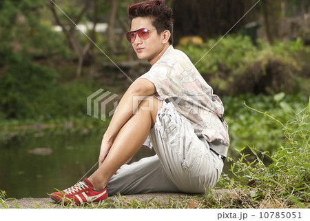 Asian man in printed polo Asian man in printed polo 10785051