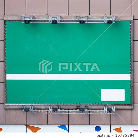green blank billboard with spotlight for your text or picture 10785594