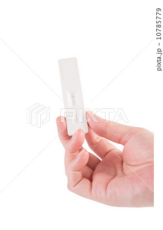 pregnancy test in hand isolated on white 10785779