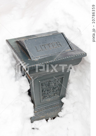 vintage Garbage Can covered by snowy 10786359
