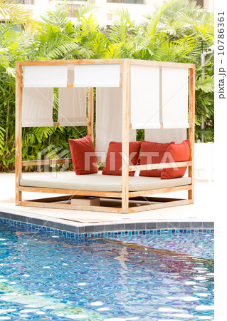 pool bed beside the pool 10786361