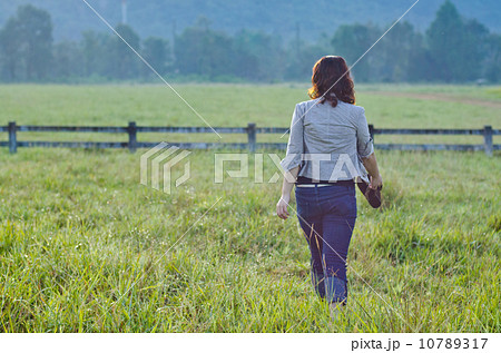 Pretty woman enjoying nature 10789317