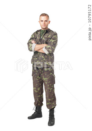 Full length portrait of serious army soldier with his arms cross Full length portrait of serious army soldier with his arms cross 10795172