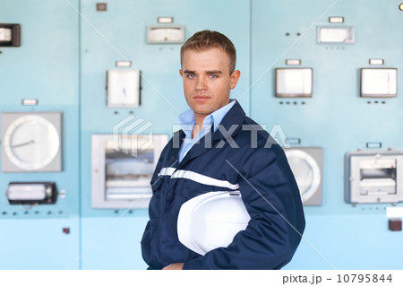young engineer at control room young engineer at control room 10795844
