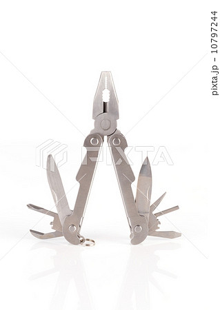 a metallic multitool isolated on white a metallic multitool isolated on white 10797244