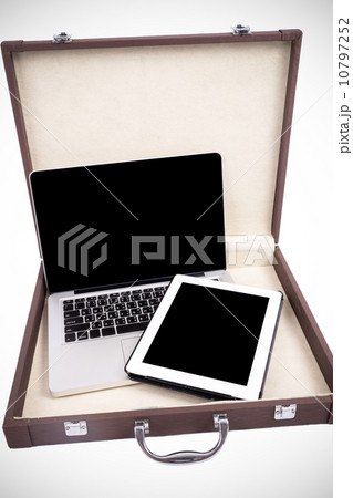 Open laptop with digital tablet in briefcase. isolated on white. Open laptop with digital tablet in briefcase. isolated on white. 10797252