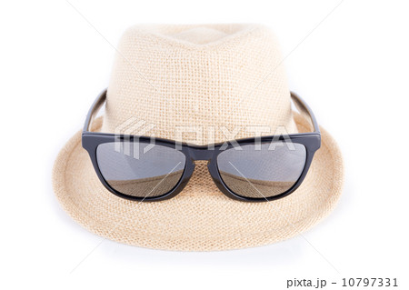 hat and sunglasses isolated on a white background 10797331