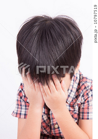 Young little boy crying or playing with hiding face 10797519