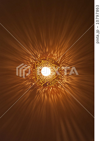 the clay pot is shone from within 10797863