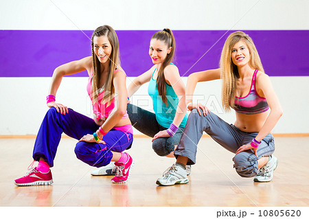 Dancer at Zumba fitness training in dance studio Dancer at Zumba fitness training in dance studio 10805620