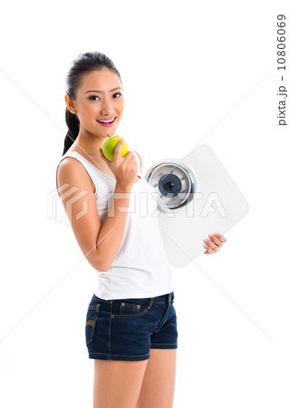 Asian woman losing weight with diet 10806069