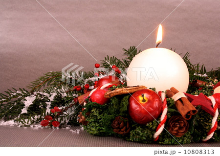 Christmas wreath with candle and Christmas decoration Christmas wreath with candle and Christmas decoration 10808313