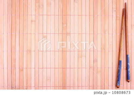 Chopsticks for sushi on bamboo background 10808673