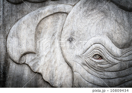 An ancient mural wood carving from Thailand process in Black and white tone An ancient mural wood carving from Thailand process in Black and white tone 10809434