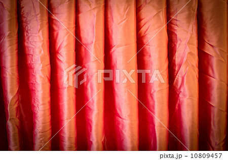 dense textile curtain background with folds with vignette dense textile curtain background with folds with vignette 10809457
