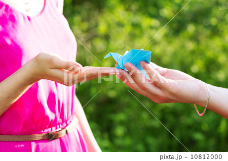 Couple holding hands with ring Couple holding hands with ring 10812000