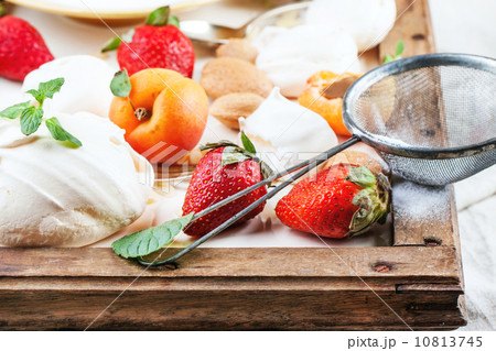 Meringue with apricot and strawberry 10813745