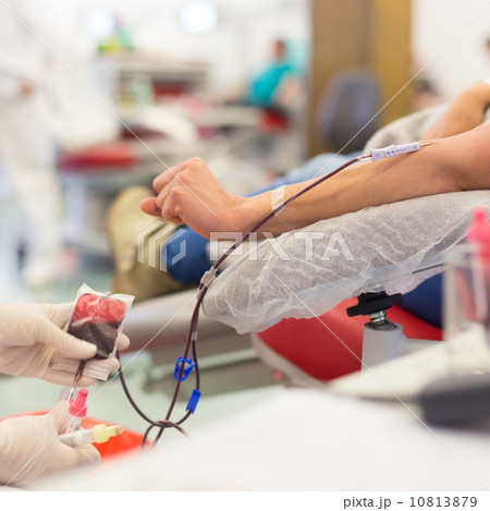 Nurse and blood donor at donation. Nurse and blood donor at donation. 10813879