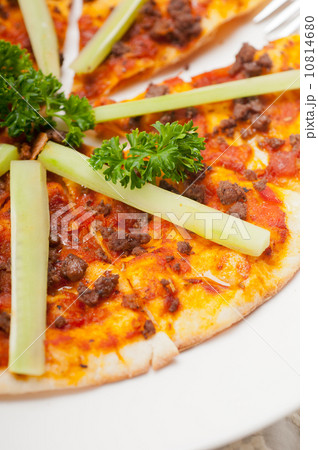 Turkish beef pizza with cucumber on top 10814680