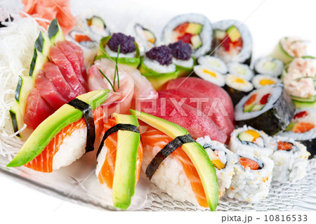 Delicious sushi platter of seafood and papaya slices. Close-up. 10816533