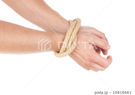 Limitation of movement at the hands tied with a rope. The man. 10816661