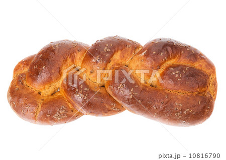 Homemade baked bread form pigtails. On a white background close-up. 10816790
