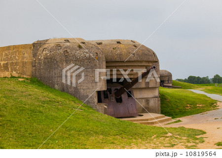Old broken German bunkers of Atlantic Wall and artillery battery Old broken German bunkers of Atlantic Wall and artillery battery 10819564