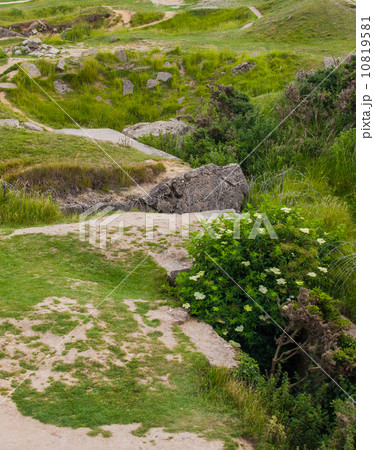 Old broken German bunkers of Atlantic Wall on Pointe-Du-Hoc. Wes Old broken German bunkers of Atlantic Wall on Pointe-Du-Hoc. Wes 10819581
