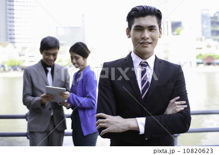 Asian working professionals outdoor 10820623