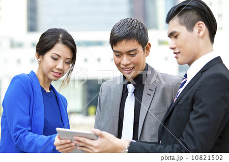 Three business office worker looking at tablet presentation close up 10821502
