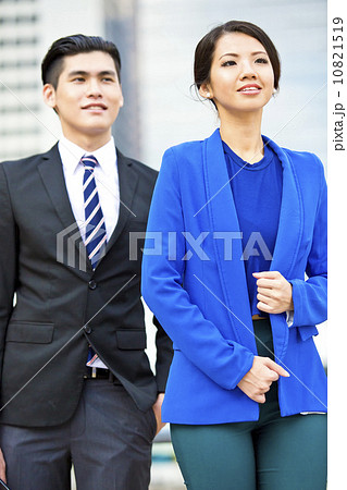 Two business executives looking ahead 10821519