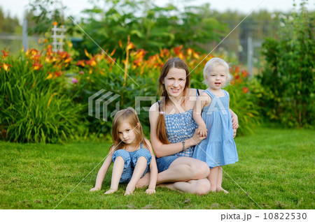 Young mother and her two little daughters 10822530