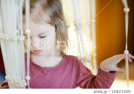 Adorable little girl portrait indoors 10823300