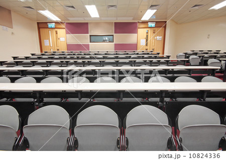 Empty hall for presentation with grey armchairs 10824336