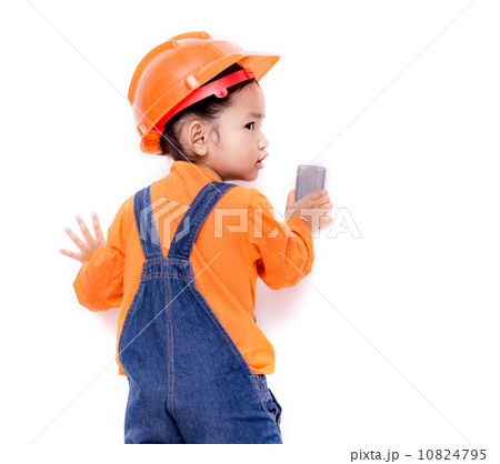 Asian Engineer baby girl with eraser brush in hand 10824795