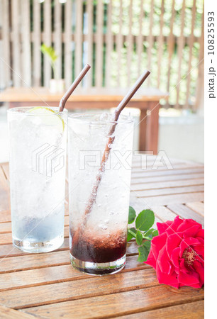 Cold herb drinks serving on wood table Cold herb drinks serving on wood table 10825593