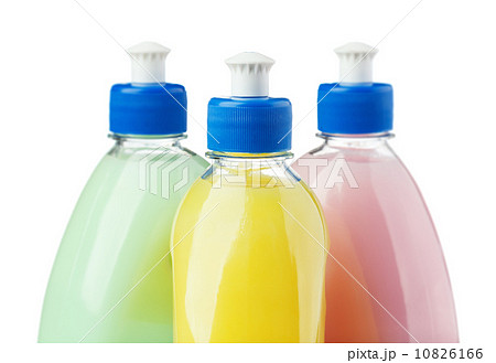 Three different colored bottles top isolated on white 10826166