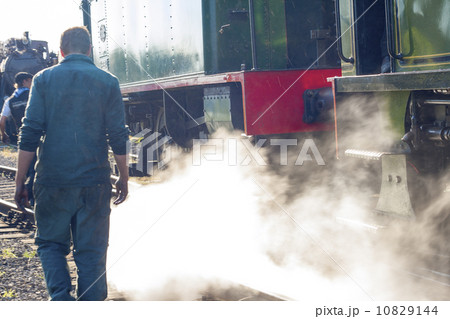 vintage steam train locomotive on railroad 10829144