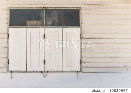 old window on white wooden 10829947