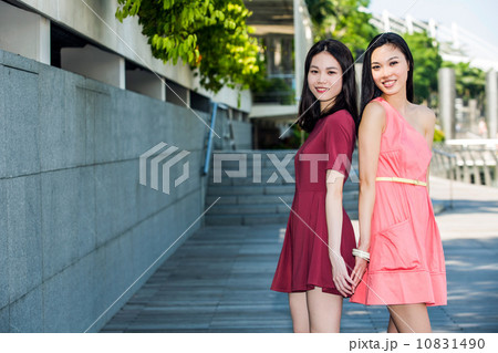 Young asian female shoppers 10831490