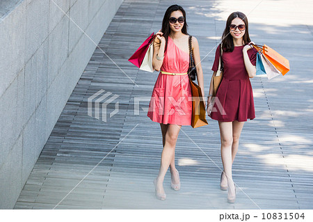 Young asian female shoppers 10831504