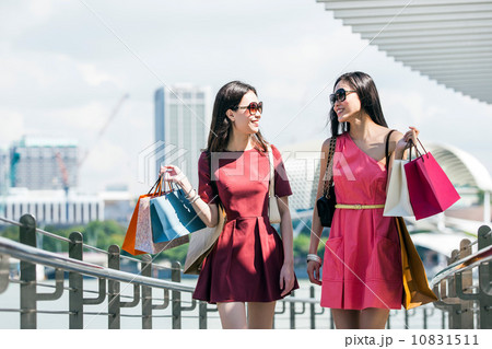 Young asian female shoppers 10831511