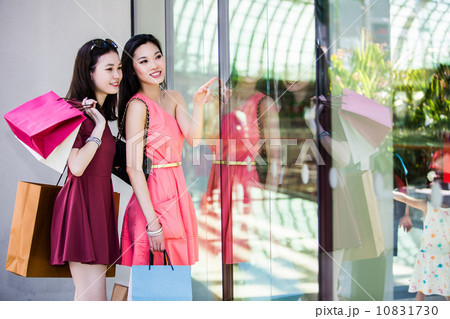 Young asian female shoppers Young asian female shoppers 10831730