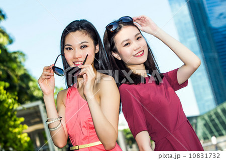 Young asian female shoppers 10831732